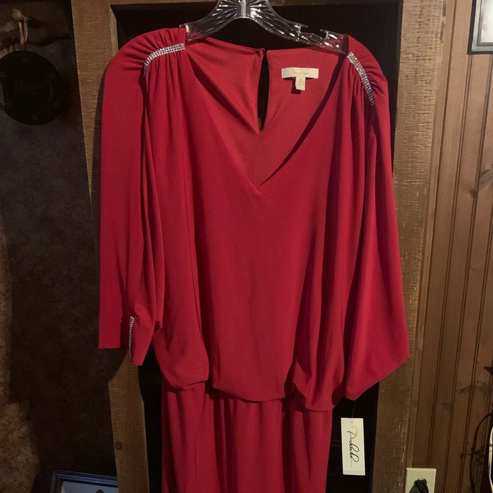 Red dress with key hole arms.